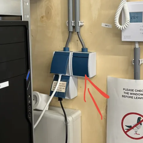 The light switch can be found near the door, to the right of the
GitLab Runners.